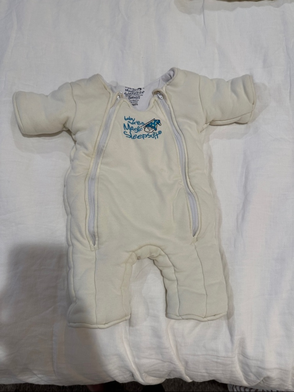 Baby Merlin’s magic sleep suit size small